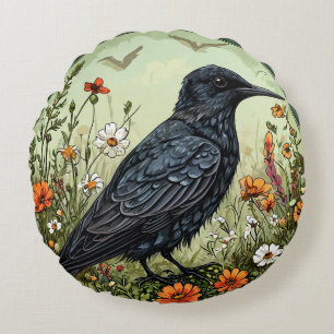 Cojín Redondo Charrán negro entre flores en flor