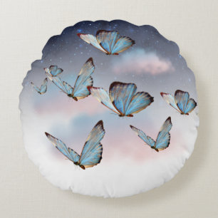 Cojín redondo con mariposas
