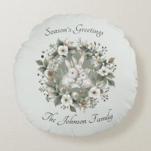 Conejos muertos en una floral corona de invierno