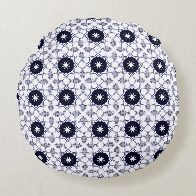 Cojín Redondo decorative pillow featuring a geometric pattern (Anverso)