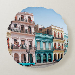 COJÍN REDONDO DOS COCHES ESTACIONADOS FUERA DEL EDIFICIO