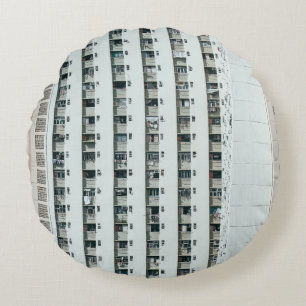 COJÍN REDONDO EDIFICIO DE CONCRETO BLANCO Y AZUL