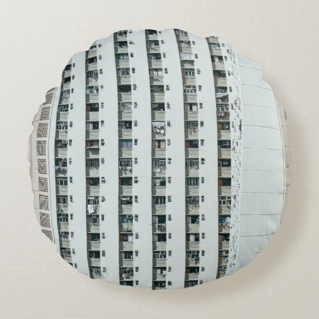 COJÍN REDONDO EDIFICIO DE CONCRETO BLANCO Y AZUL (Anverso)