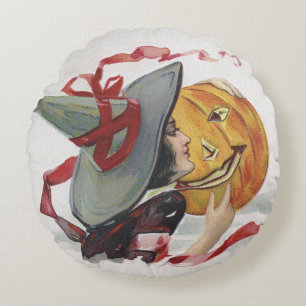 Cojín Redondo El beso de la bruja: una calabaza de Halloween