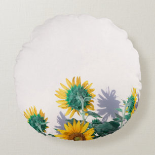 Cojín Redondo Flores azules y amarillas en la pared blanca