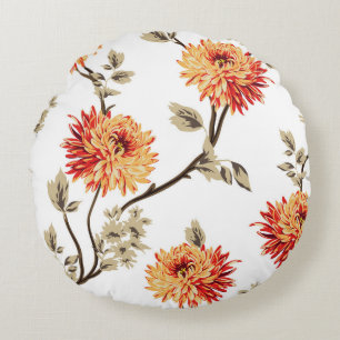 Cojín Redondo flores naranjas lindas con un patrón de hojas marr
