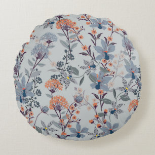 Cojín Redondo Flores silvestres en azul, patrón botánico.