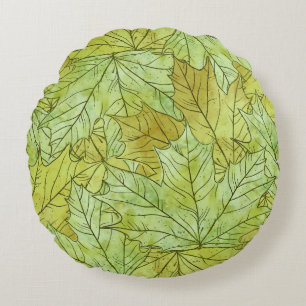 COJÍN REDONDO HOJAS DE CAÍDA VERDE Y NARANJA