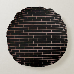 Cojín Redondo La pared de ladrillo negro oscuro tiene una superf