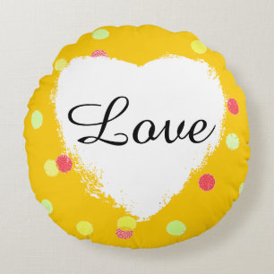 Cojín Redondo lunares rosados, amarillos y amor blanco del