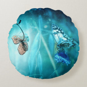 Cojín Redondo Mariposa azul surrealista