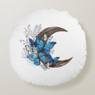 Cojín Redondo Mariposas azules sobre la media luna de madera