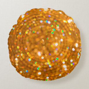Cojín Redondo Navidades de bokeh borrosos de lujo dorado.