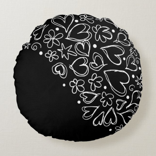Cojín redondo negro con corazones blancos (Anverso)