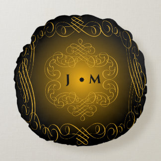 Cojín Redondo Negro y oro con elementos decorativos