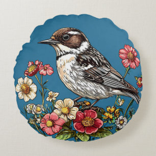 Cojín Redondo Pájaro enmarcado por flores vibrantes