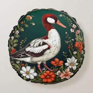 Cojín Redondo Pato elegante rodeado de flores vibrantes