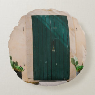 COJÍN REDONDO PLANTA DE CACTUO VERDE CERCA DE LA PUERTA VERDE
