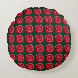 Cojín Redondo rosas rojas en un fondo verde abstracto, de fondo
