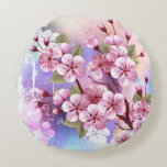 Cojín Redondo Sakura rosa sobre fondo de pintura<br><div class="desc">Dibujado artísticamente,  rama de rosa,  flores de cerezo sobre fondo pintoresco,  texturizado,  pintado con pintura blanca,  rosa y azul. Pink Sakura</div>