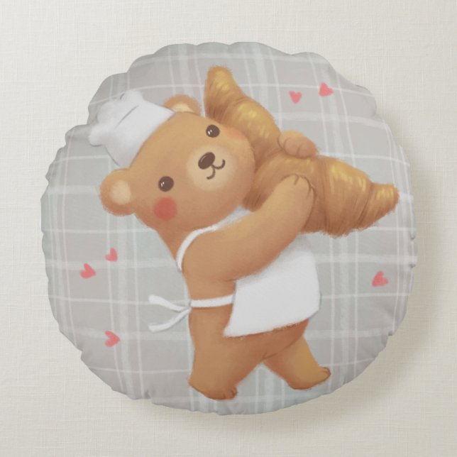 Cojín Redondo Teddy el panadero con croissant (Anverso)