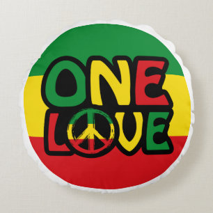 Cojín Redondo Un amor, diseño de reggae con colores de reggae