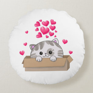 Cojín Redondo Un gatito lindo asomando una caja