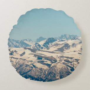Cojín Redondo Una cordillera con nieve descongelante y hielo en 