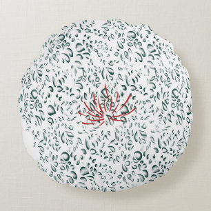 Cojín Redondo una flor roja sobre un fondo negro