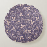 Cojín Redondo Vintage Floral Design with Swirling Vines<br><div class="desc">Floral pattern with beige flowers and leaves on a purple background. The design features swirling vines,  creating an elegant and vintage aesthetic.</div>