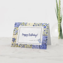 Colcha azul de cumpleaños con tarjeta de aguja