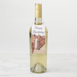 Colgador Para Botellas Caballos hociqueando en una pradera