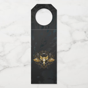 Colgador Para Botellas Cráneo de pájaro dorado sobre fondo negro