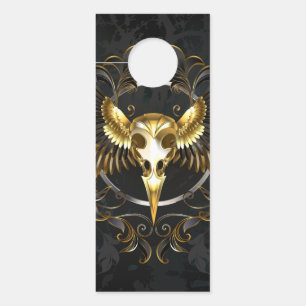 Colgador Para Puertas Cráneo de pájaro dorado sobre fondo negro