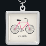 Collar personalizado bicicleta de las rosas<br><div class="desc">Un colgante que ofrece un ilustracion de una rosa fuerte monta en bicicleta.  Personalice con su nombre debajo de la bici.</div>