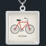 Collar personalizado bicicleta roja<br><div class="desc">Un colgante que ofrece un ilustracion de una bicicleta roja.  Personalice con su nombre debajo de la bici.</div>