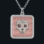 Collar Plateado Calavera de azúcar rosa y dorada y corazones capri<br><div class="desc">escote</div>