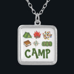 Collar Plateado CAMP Tent Campfire Compass Camping Smores Necklard<br><div class="desc">El collar presenta un original ilustracion de marcadores de objetos relacionados con el camping que incluyen una fogata,  aromas,  mezcla de caminos,  carpa,  brújula y saco de dormir,  con CAMP en una fuente divertida.</div>