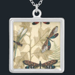 Collar Plateado Dragonflies coloridas flotando sobre hojas<br><div class="desc">Enormes libélulas flotan sobre hojas en esta pieza de Megan Meagher. Una atractiva representación de la naturaleza. ¡Asegúrate de ponerlo en tu pared favorita!</div>