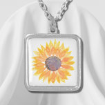 Collar Plateado Girasol amarillo<br><div class="desc">Este collar de flores está decorado con un girasol color agua amarillo. Acuarela original © Michele Davies.</div>