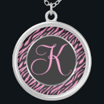 Collar Plateado Letra de lujo K del estampado de zebra rosado<br><div class="desc">Script la letra K en rosa en un fondo negro y rosado del estampado de zebra.</div>