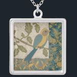 Collar Plateado Pájaro azul amarillo y Verde azulado encaramado en<br><div class="desc">Esta hermosa pintura de un pájaro azul amarillo y verde azulado sobre una rama encajaría perfectamente en cualquier producto de Zazzle. La pintura de Chariklia Zarris,  inspirada en el collage,  se compone de muchos patrones,  flores y hojas diferentes. ¡Descúbrelos!</div>