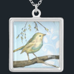 Collar Plateado Pequeño pájaro amarillo encaramado en una rama mir<br><div class="desc">Esta pintura es perfecta para tu colección de aves. El pequeño pájaro amarillo y el fondo azul pastel de esta imagen son sencillos pero relajantes y se pueden añadir fácilmente a cualquier producto Zazzle que se ofrezca. Elija esta huella de arte hoy.</div>