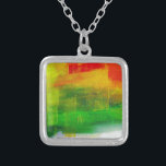 Collar Plateado Pintura abstracta<br><div class="desc">Pintura abstracta en rojo,  verde y amarillo</div>