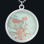 Collar Plateado Silhouette de flores rojas sobre fondo Verde azula<br><div class="desc">Tres flores rojas contrastan con un fondo verde azulado en esta pintura de Megan Meagher. Una silueta de otra flor se inclina desde la izquierda de la impresión. Una simple pieza con mucho en curso. Esto haría un buen regalo para un amigo o querido que disfruta el arte!</div>