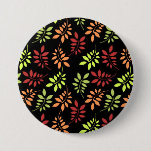 Coloridas hojas de otoño en el botón de tonos cáli