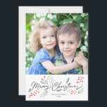 Coloridos Doodles Fotos de navidad<br><div class="desc">Esta brillante y colorida tarjeta de festividad fotográfica muestra nuestros dibujos folclóricos de vacaciones ilustrados y dice "Feliz Navidad" en un guión moderno. Viene con un patrón de coincidencia en el reverso para una tarjeta especial extra. Este diseño forma parte de una colección.</div>