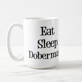 Coma la taza del Doberman del sueño