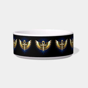Comedero Ankh de oro con alas