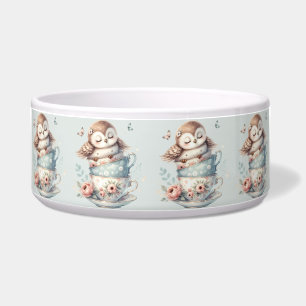Comedero Búho durmiendo en tazas de té florales apiladas